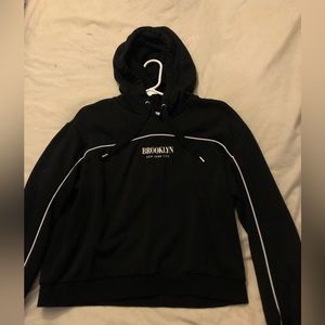 Divided black Brooklyn hoodie. Size L